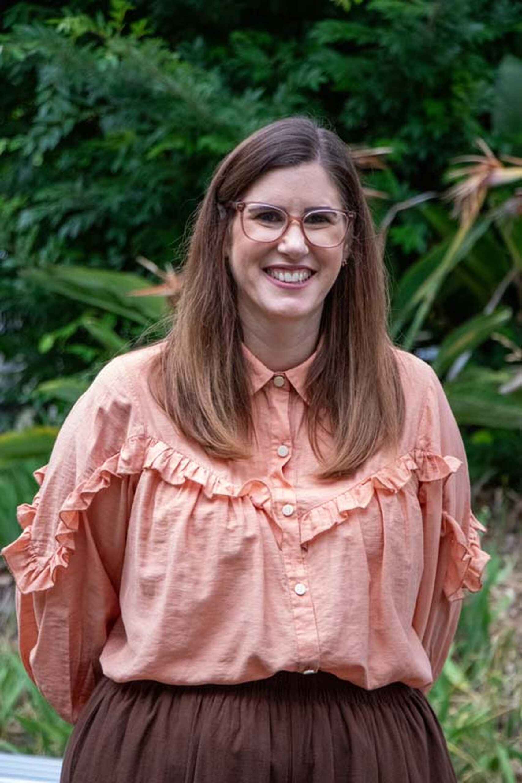 Portrait of principal outdoors on the school grounds.
